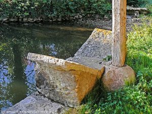 pierre à laver en forme de papillon